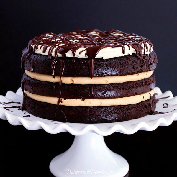 The Tipsy Whiskey Layer Cake - layers of whiskey infused chocolate cake, Irish cream buttercream and spiked mascarpone frosting! | ButtercreamBlondie.com