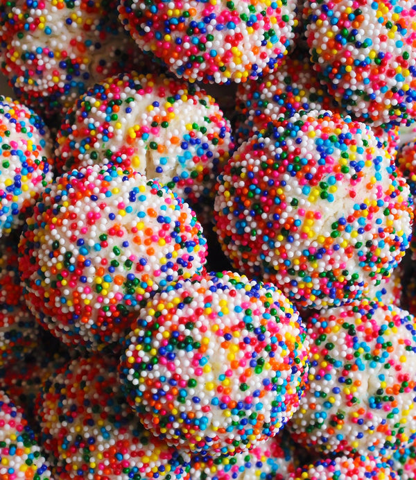 Bourbon confetti cookies are simple, fun and delicious. Cream cheese, bourbon and sprinkles make these my go-to confetti cookies.